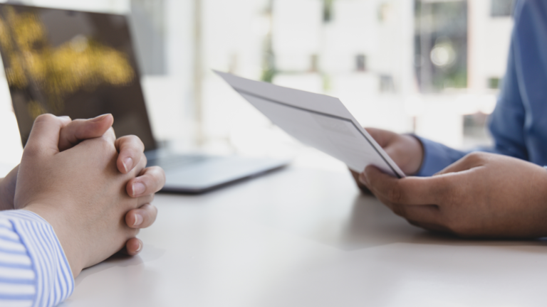 8 Type of interview question picture showing a person having a list of interview questions